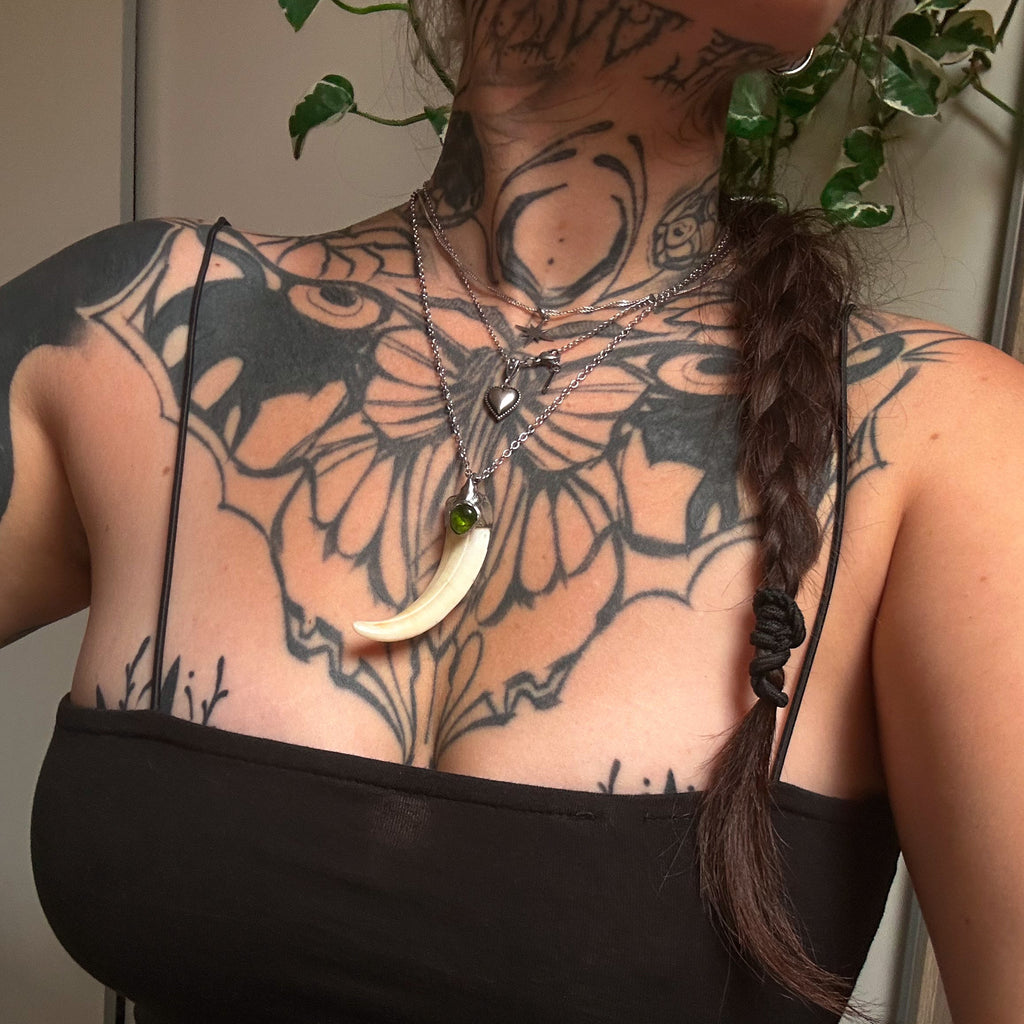 Boar tusk necklace - olivine