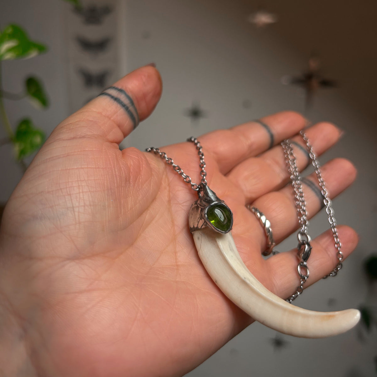 Boar tusk necklace - olivine